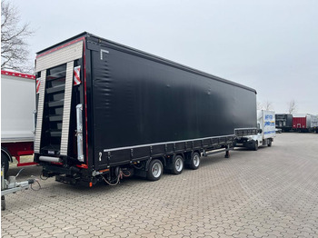 Low loader semi-trailer