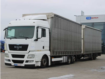 Curtainsider truck MAN TGX 24.440